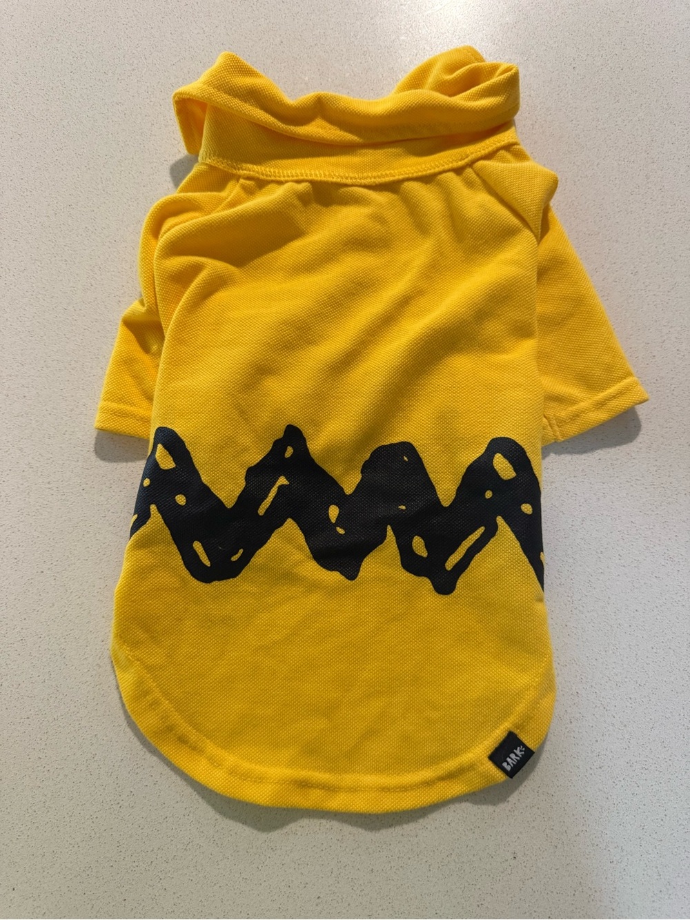 Small dog charlie brown polo bark brand